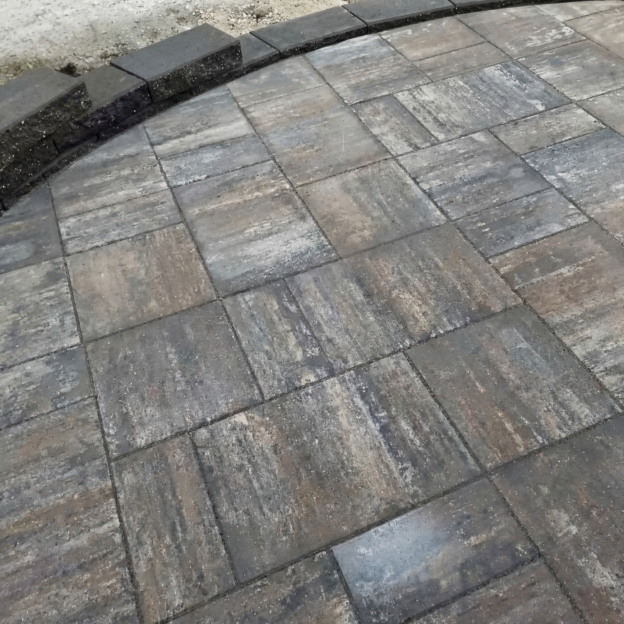 Detail of a finished paver patio surface